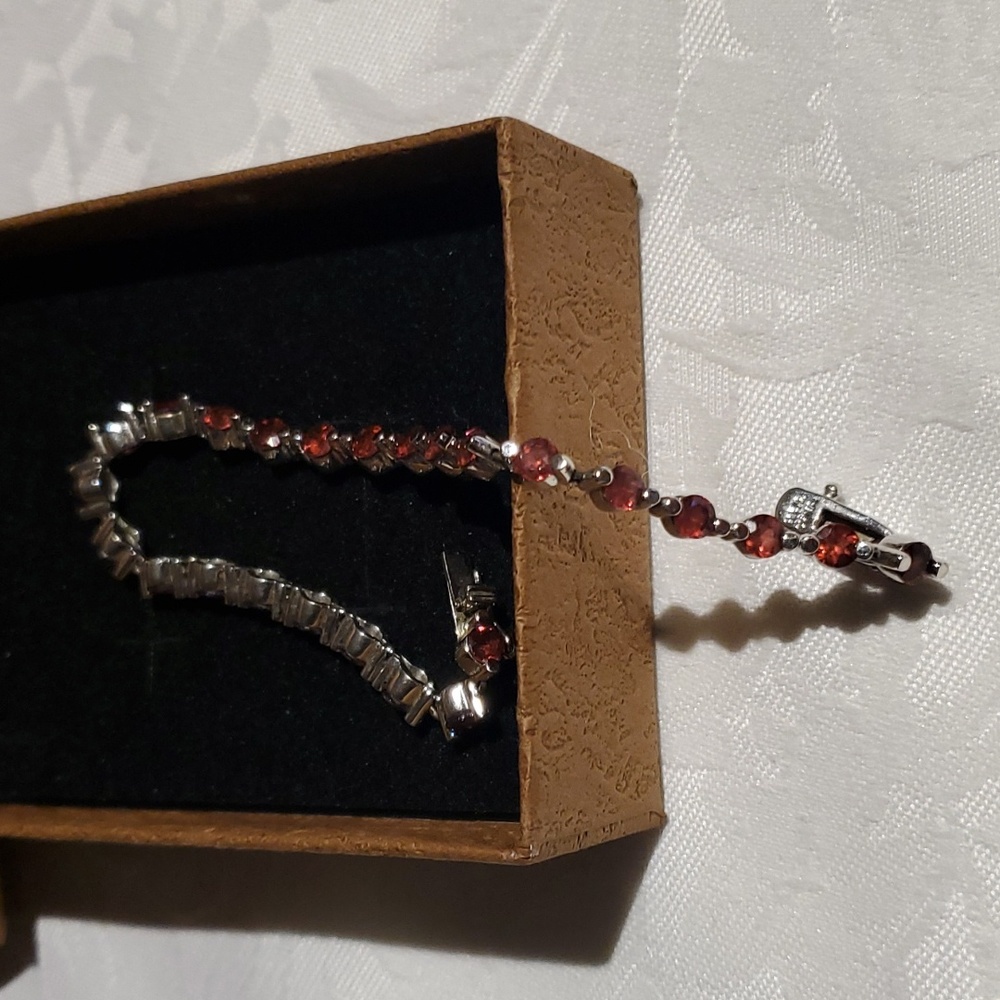 Genuine Garnet stone tennis bracelet.